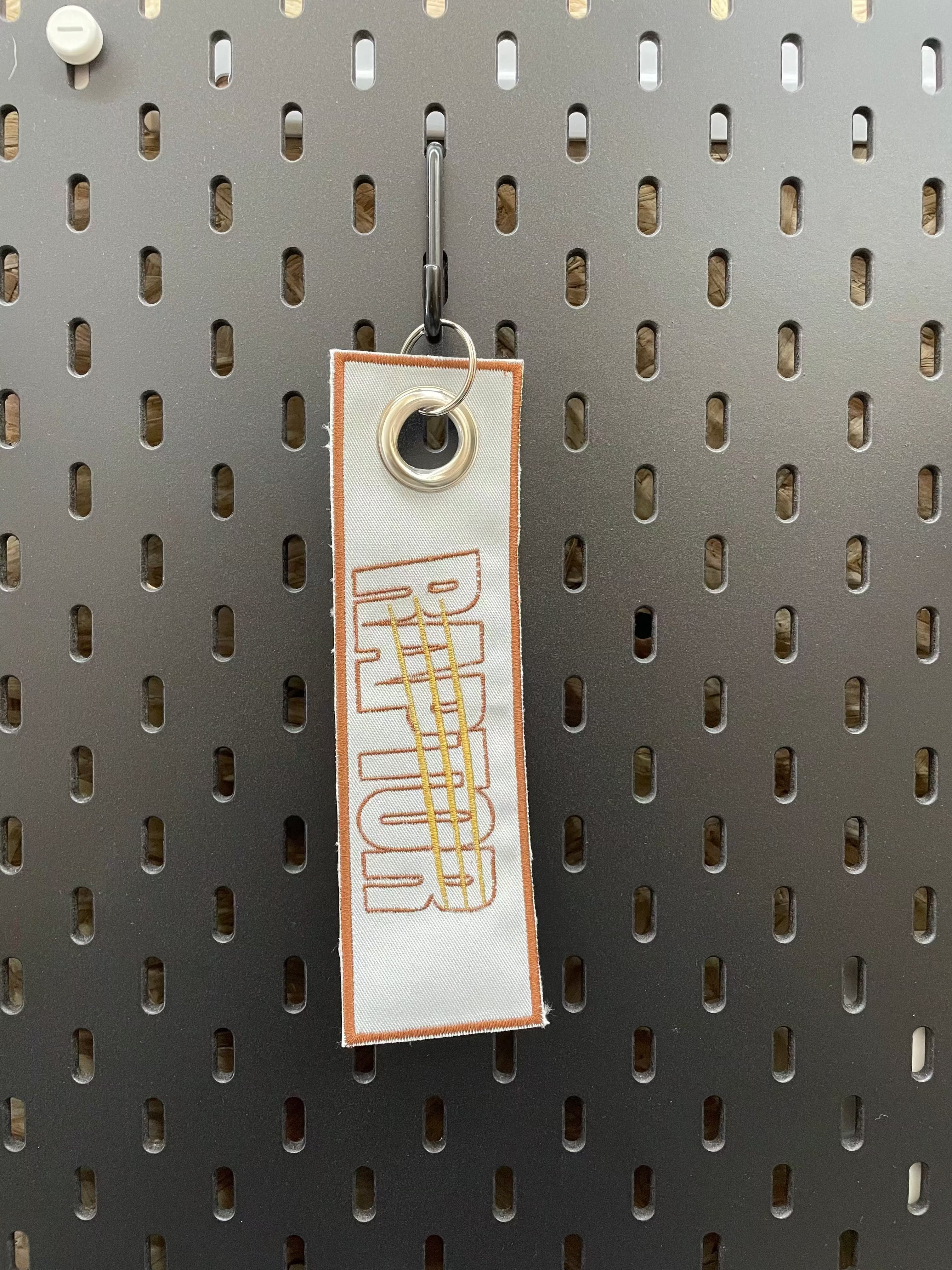 Porte-clé rodé raptor marron