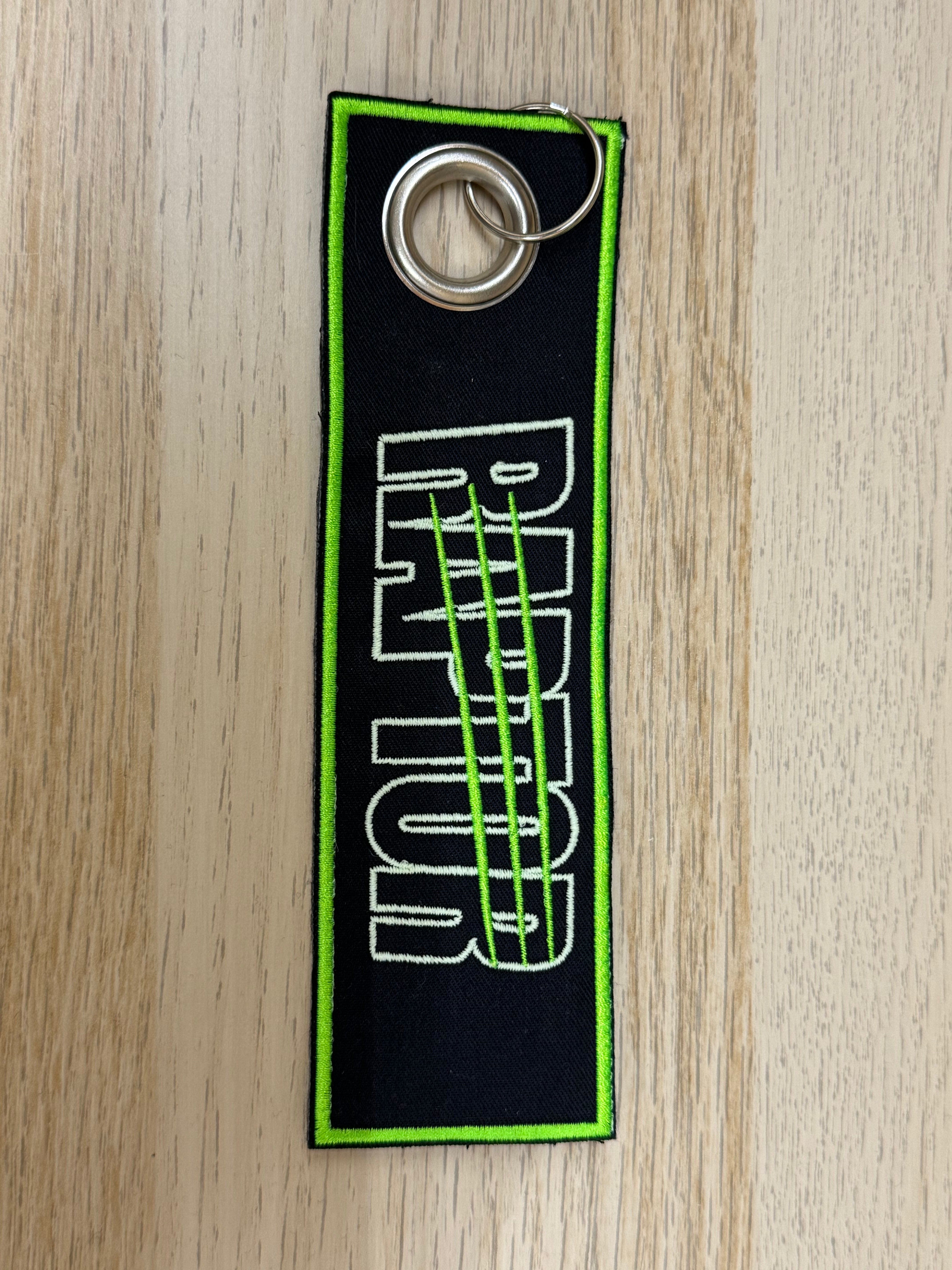 Porte clé brodé Phosphorescent